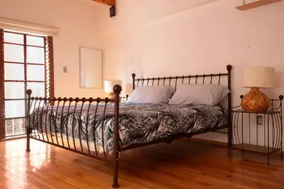 Cama o camas de una habitación en Nido Coyoacán