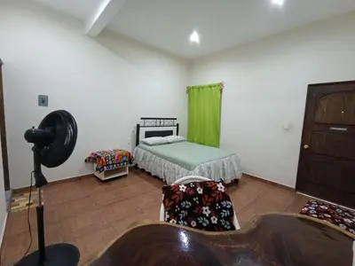 Cama o camas de una habitación en HABITACION PRIVADA CON BAÑO PRIVADO, VENTILADOR, WiFi Y RESTAURANT