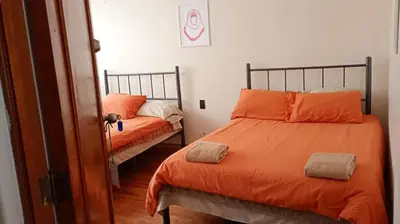 Cama o camas de una habitación en Hostal Kahlo - El sol y el viento- 4 personas