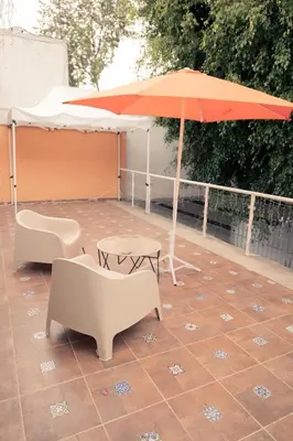 Un balcón o terraza de Hostal Kahlo - El sol y el viento- 4 personas