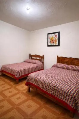 Cama o camas de una habitación en Hospedaje Rayo De Sol