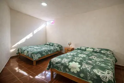 Cama o camas de una habitación en Hospedaje Rayo De Sol