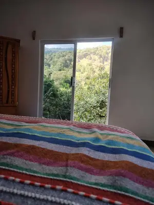 Cama o camas de una habitación en Temazcal en la montaña, hospedaje