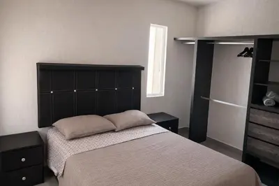 Cama o camas de una habitación en PH Puerta al Sol
