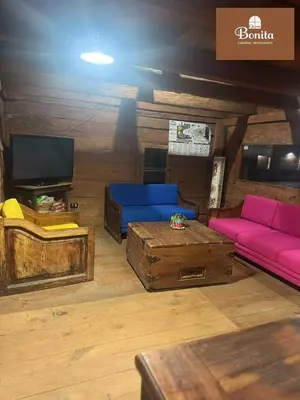 Una televisión o centro de entretenimiento en Quinta Bonita