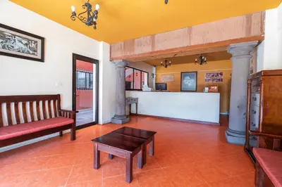 Zona de estar de Mesón Real Hotel & Suites