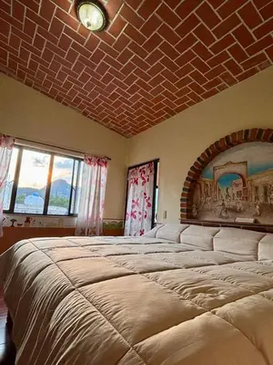 Cama o camas de una habitación en Hotel-Posada Kali Tlayacapan