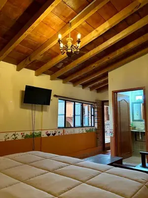 Cama o camas de una habitación en Hotel-Posada Kali Tlayacapan