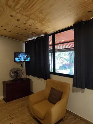 Una televisión o centro de entretenimiento en LOFT 2 PAX en Matías Romero, moderno y cómodo