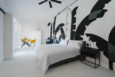 Cama o camas de una habitación en Cocoon Oaxaca City- Curated Stay In Oaxaca Centro