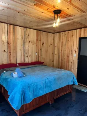 Cama o camas de una habitación en Cabaña OLIN