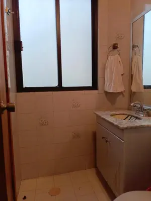 Un baño de Cerca de estadio GNP