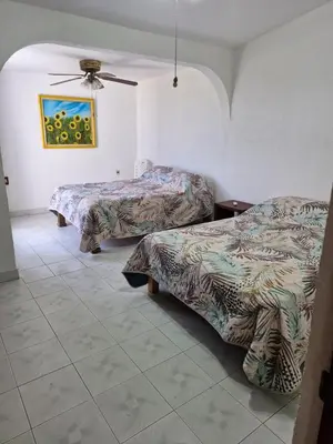 Cama o camas de una habitación en Casa FLAMINGOS