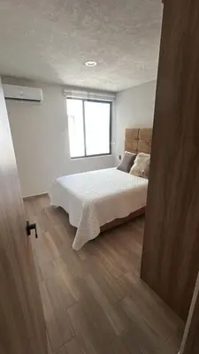 Cama o camas de una habitación en Santa Fe Dorado Atardecer