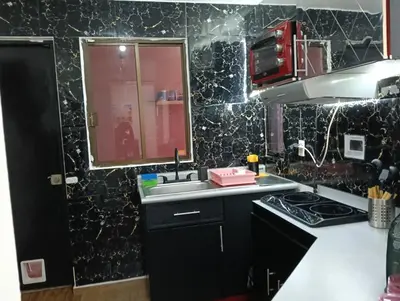 Una cocina o zona de cocina en Departamento Playa Mocambo