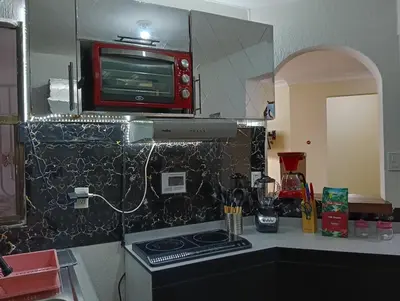 Una cocina o zona de cocina en Departamento Playa Mocambo