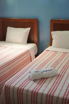Cama o camas de una habitación en Hotel Reforma
