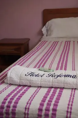 Cama o camas de una habitación en Hotel Reforma