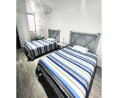 Cama o camas de una habitación en Casa Delfines Puerto Escondido