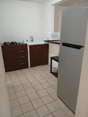 Una cocina o zona de cocina en Two-bedroom condo Ground floor