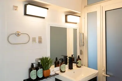 Un baño de Altos del Centro, Loft privado con vista al Valle