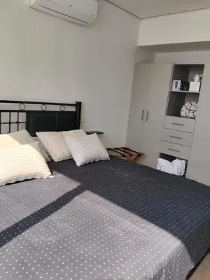 Cama o camas de una habitación en Depa frente al mar en acapulco costera con alberca