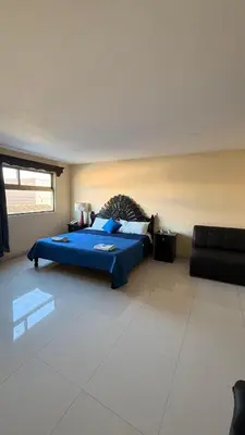 Zona de estar de Hotel Boutique Los Laureles