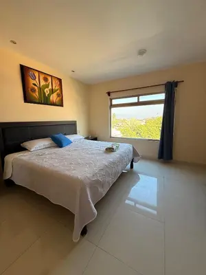 Cama o camas de una habitación en Hotel Boutique Los Laureles