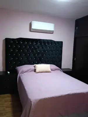 Cama o camas de una habitación en Departamento playa Mocambo