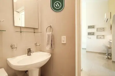 Un baño de 2BR Condo in Acapulco with Private Patio - Pool