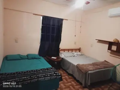 Cama o camas de una habitación en Casa de ámbar cuatunalco