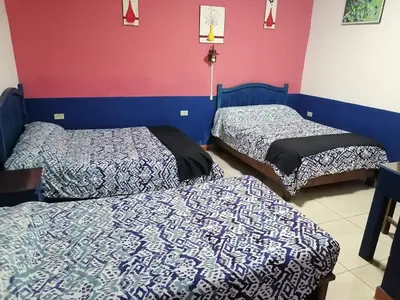 Cama o camas de una habitación en Hotel los remedios puebla cholula