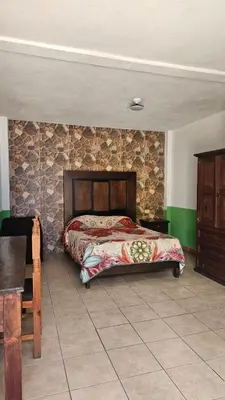 Cama o camas de una habitación en Hotel los remedios puebla cholula
