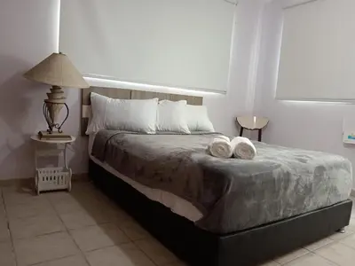 Cama o camas de una habitación en Casa de la Abuela por la Playa