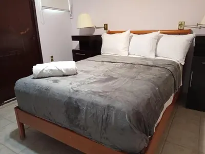 Cama o camas de una habitación en Casa de la Abuela por la Playa