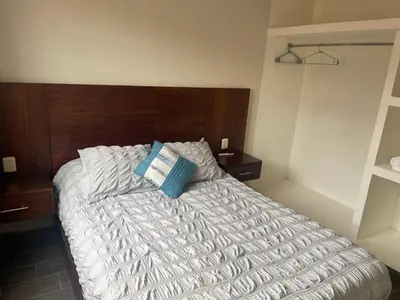 Cama o camas de una habitación en Hogar cómodo para descansar en Acapulco