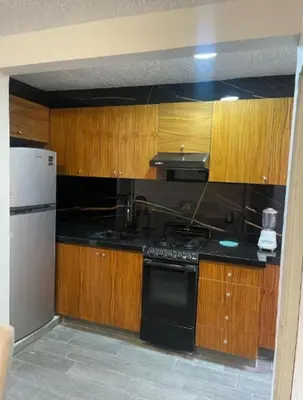 Una cocina o zona de cocina en Hogar cómodo para descansar en Acapulco