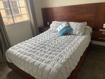 Cama o camas de una habitación en Hogar cómodo para descansar en Acapulco