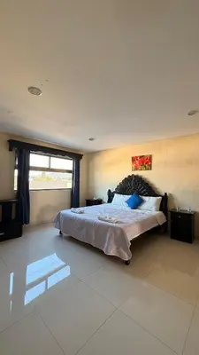 Cama o camas de una habitación en Hotel Boutique Los Laureles