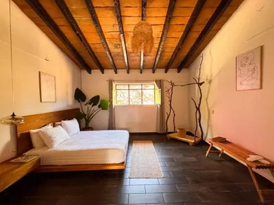 Cama o camas de una habitación en Umbral Habitacion Natural Privada