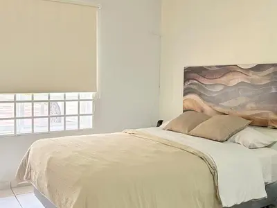 Cama o camas de una habitación en Villa Ixora-Casa privada 1 recámara en Agua Dulce