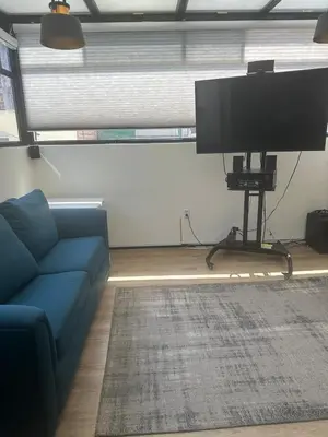 Una televisión o centro de entretenimiento en Casa Realce