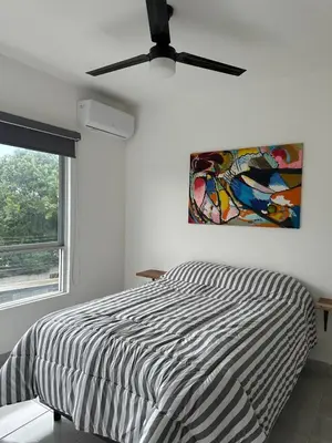Cama o camas de una habitación en Apartamento con acceso directo al río
