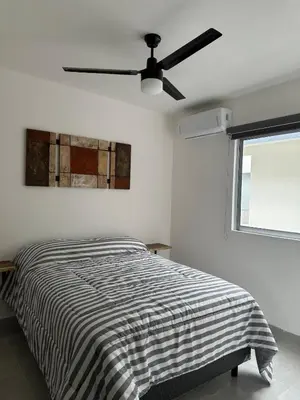 Cama o camas de una habitación en Apartamento con acceso directo al río