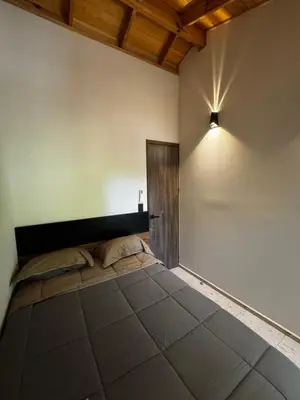 Cama o camas de una habitación en Mini Casa TGZ