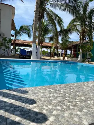 Piscina en o cerca de Cabaña el Coral