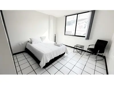 Cama o camas de una habitación en HOMSTY Depa Pizzas San Martin Texmelucan