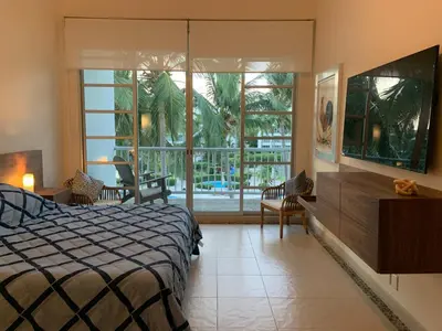 Cama o camas de una habitación en Exclusive apartment in Mayan Lakes
