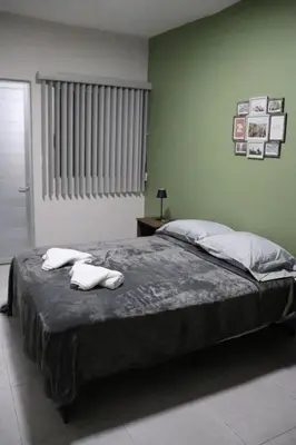 Cama o camas de una habitación en Beautiful Downtown Suite 04