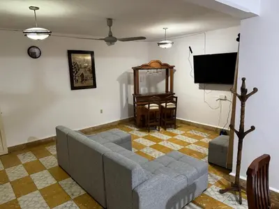 Una televisión o centro de entretenimiento en Casa de luna